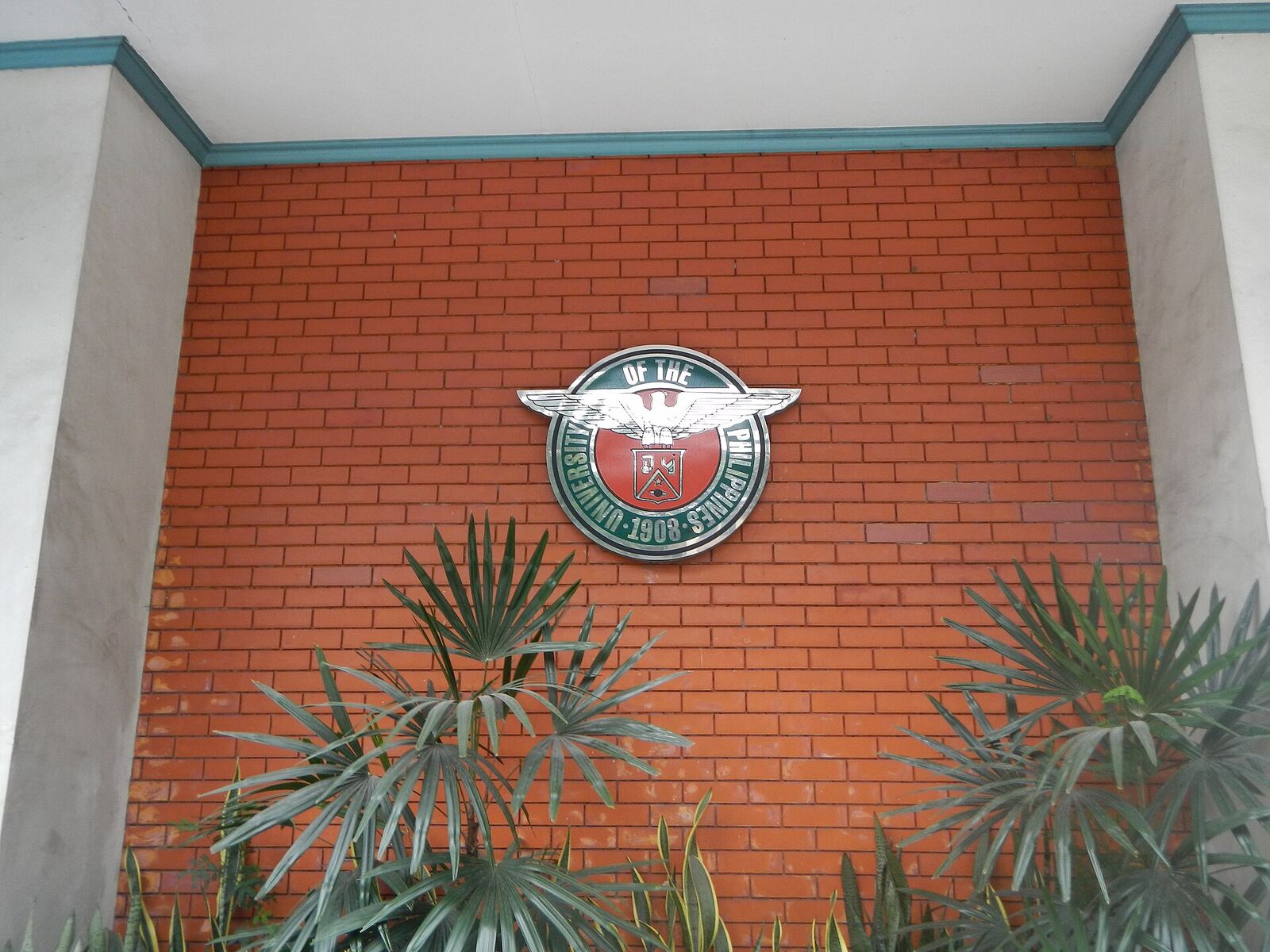 University of the Philippines Computer Center [1] The U.P. Computer Center is an independent unit of the Diliman campus [2] of the University of the Philippines [3] that provides high-speed computer and information technology services to the University faculty, administration and students. It is now under the Office of the Chancellor of UP Diliman It is housed in the UP Alumni Engineers (UPAE) Building at the back of the Melchor Hall compound. Also called the UP CC (or CC for short), the facility serves as the central hub that interconnects the fiber-optic backbones in UP Diliman and other UP campuses. The center is also the hub of the UP Diliman Wireless Network, which has over 100 WiFi Hot Spots deployed all over the campus as of 2011. The center is administered by a member of the faculty and manned by full-time employees and student assistants. Its current director is Dr. Johnrob Y. Bantang from the National Institute of Physics. [4] [5] The Computer Center and its staff during the 1970s The University Computer Center was established in September 15, 1966 by the University of the Philippines In 2011, the University Computer Center implemented the largest IPv6 network and one of the first in the country. The University Computer Center in Diliman maintains one of the largest campus networks in the country, having laid more than 50 kilometers of fiber optic cables, deploying over 100 wireless hotspots, 1024 Voice over IP (VoIP) phones, and hosting around 80 UP websites through its servers. University Computer Center is divided into 3 units namely: Administrative Unit Data Processing Unit Network and Systems Operation Unit [6] Coordinates: 14°39'26"N 121°4'12"E [7] [8]
